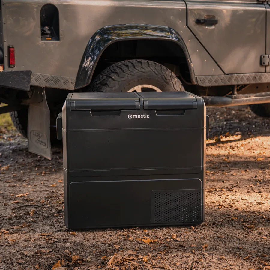 Mestic MCCM-55 dual zone cool box outdoors by a vehicle - My Mestic