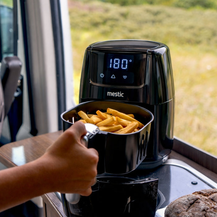 Cooking with the Mestic air fryer in a campervan kitchen — healthier meals while travelling