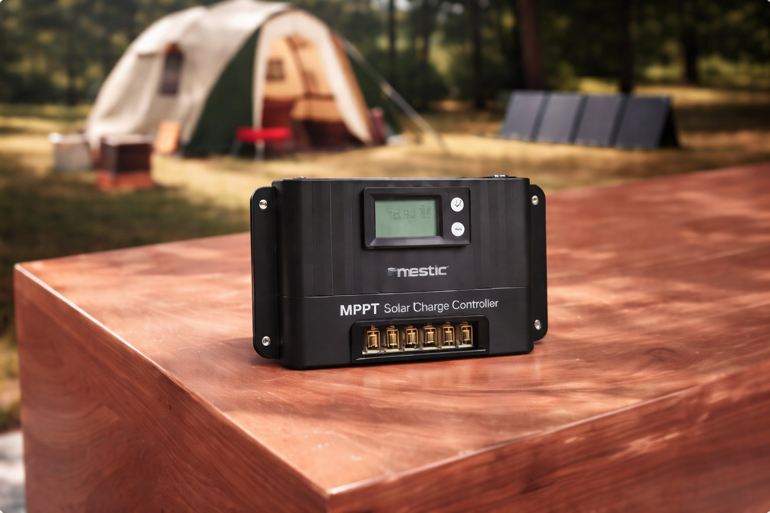 Mestic MSC-4020 MPPT charge controller at a campsite — managing solar power from a foldable panel