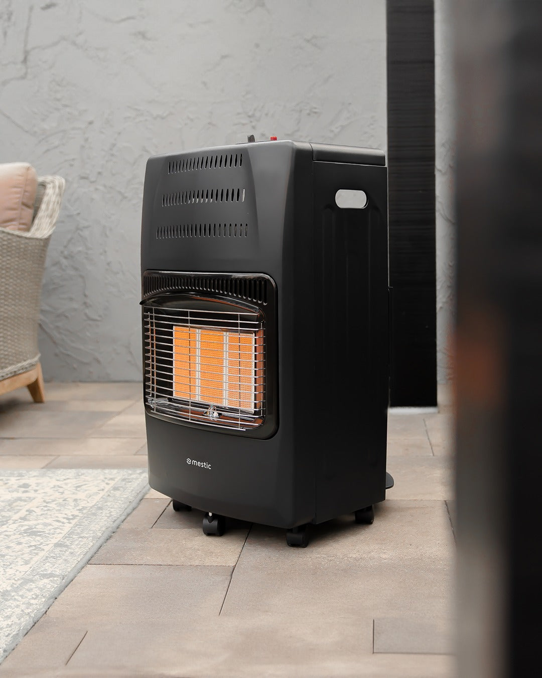 Mestic portable gas heater providing warmth in a cosy camping setting